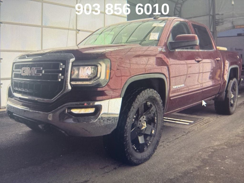 2016 GMC Sierra 4WD Crew Cab Short Box SLE's photo